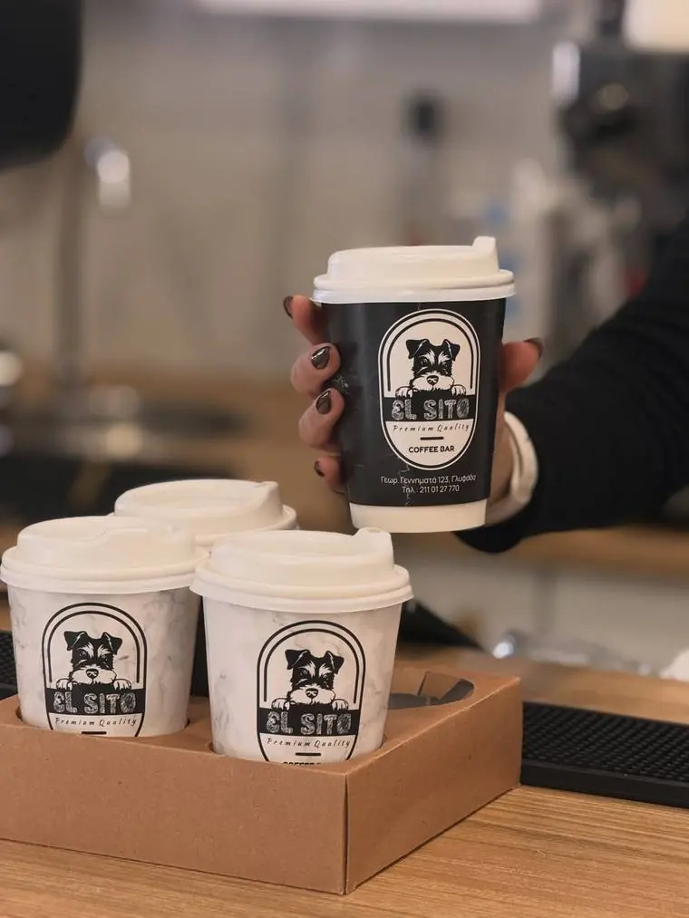 Branded takeaway cups in a carrier